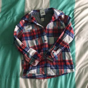 Multicolored flannel shirt.